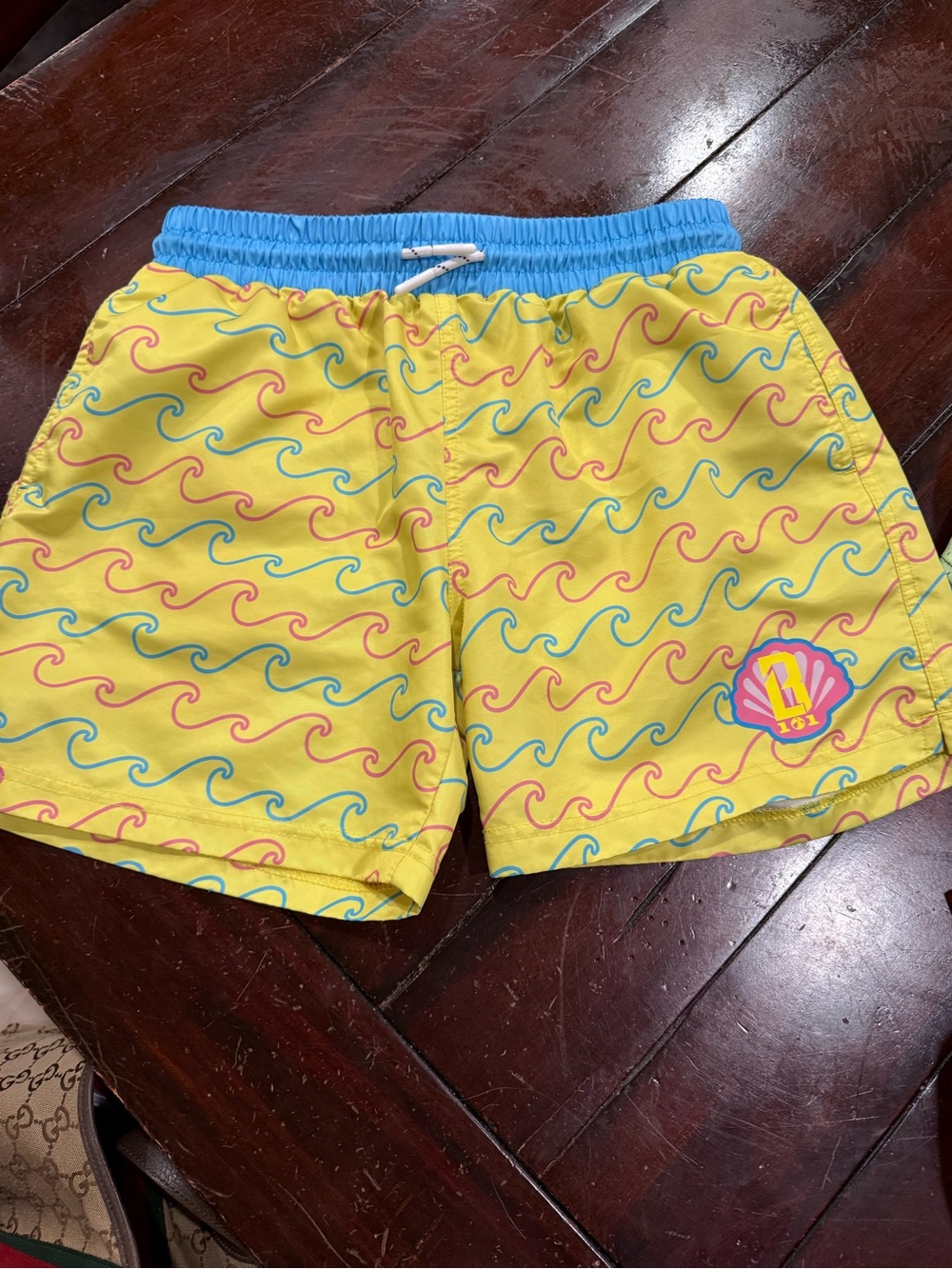 Yellow boys Swim Trunks with Blue Waistband and Wave Print